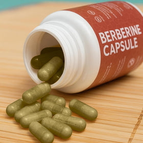 AIKOURA HERBS Berberine Complex 1350mg capsules on a wooden table