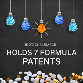 BIOTICS RESEARCH IPS bottle with a measuring spoon
