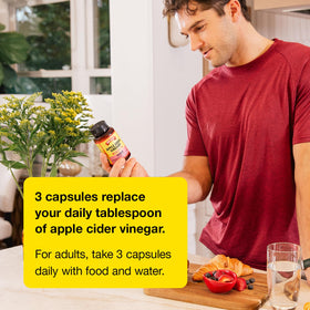 Bragg Renew Apple Cider Vinegar Capsules with a measuring spoon for dosage