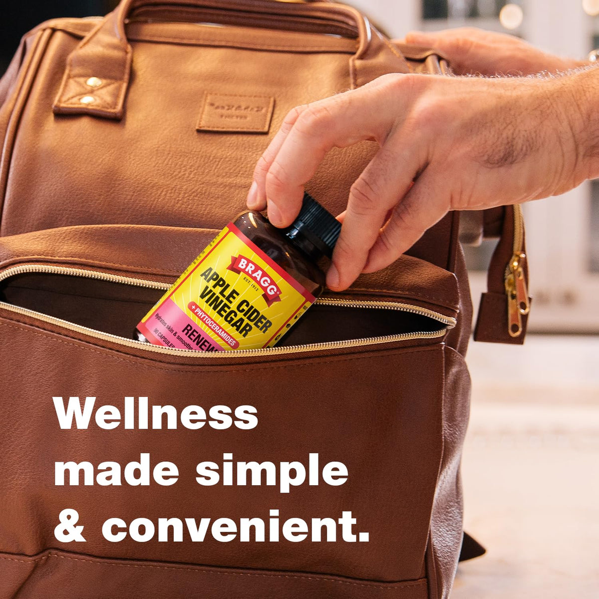 Bragg Renew Apple Cider Vinegar Capsules with phytoceramides on a wooden surface