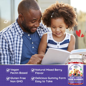 Child holding ReviNutra Iron Gummies, smiling