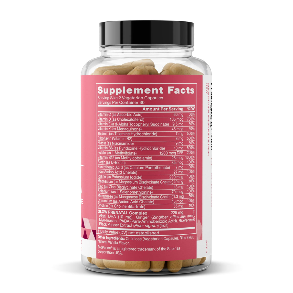 Eu Natural Glow Prenatal Vitamins capsules in a hand