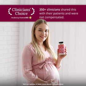 Eu Natural Glow Prenatal Vitamins capsules on a wooden surface
