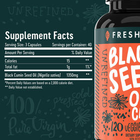 Freshfield Black Seed Oil capsules with natural background