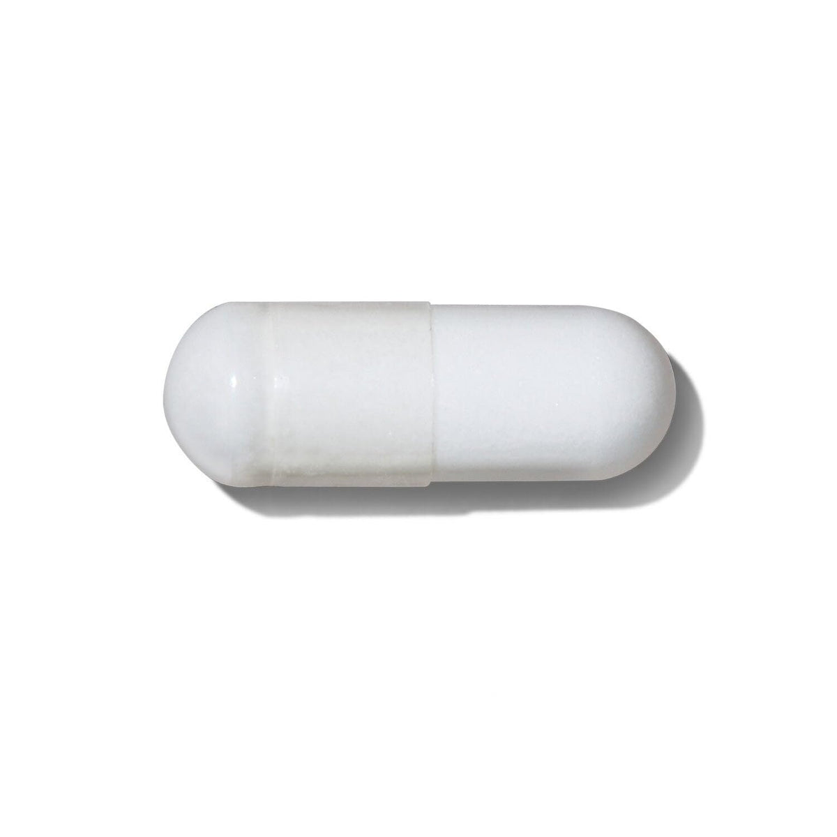 GNC Pro Performance Creatine Monohydrate capsules in hand