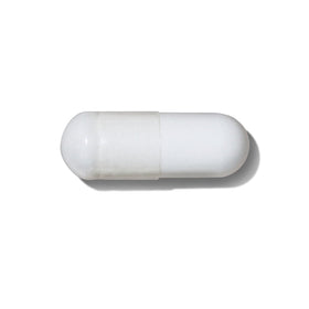 GNC Pro Performance Creatine Monohydrate capsules in hand