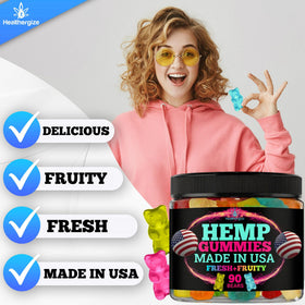 Healthergize Hemp Gummies in a bowl with fresh fruit