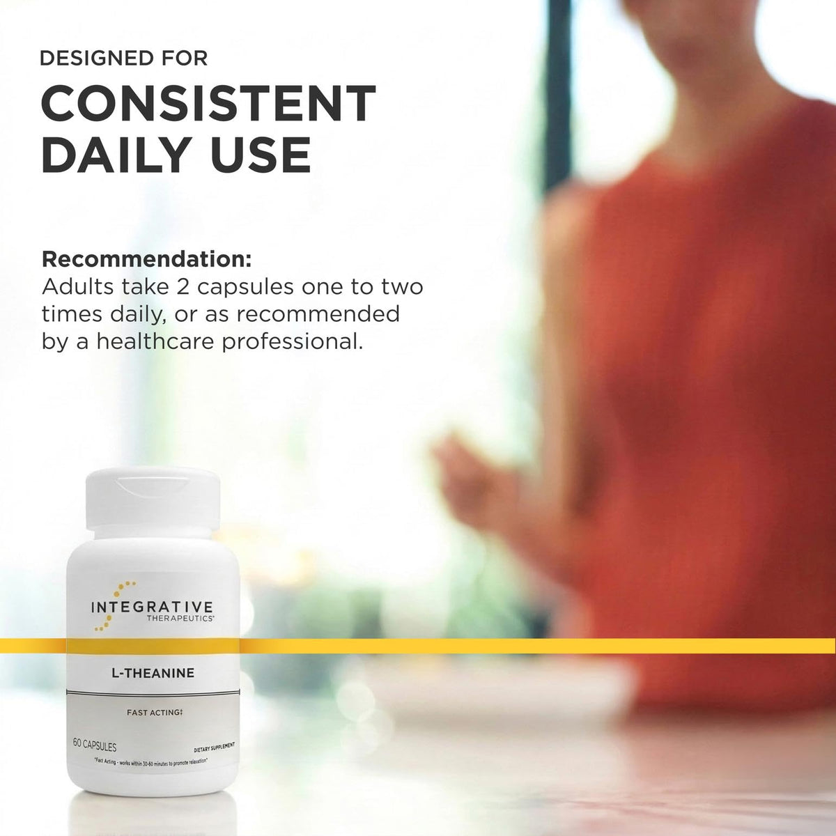 Integrative Therapeutics L-Theanine capsules in a hand