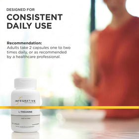 Integrative Therapeutics L-Theanine capsules in a hand