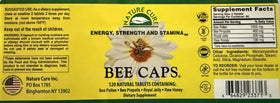 Nature Bee Caps 120 caplets displayed on a wooden table