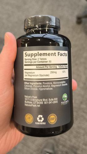 Nature's Peak Magnesium Glycinate Supplement 250mg 180 Tablets close-up of tablets