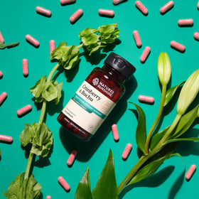Nature's Sunshine Cranberry and Buchu Concentrate 100 Capsules on a wooden table