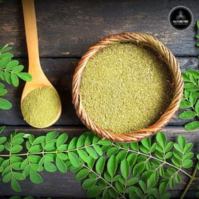 Naturevibe Botanicals Moringa Powder in a bowl for easy mixing