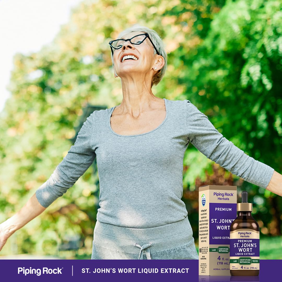 Piping Rock St John's Wort Liquid Herbal Extract 4 Fl Oz on a wooden table