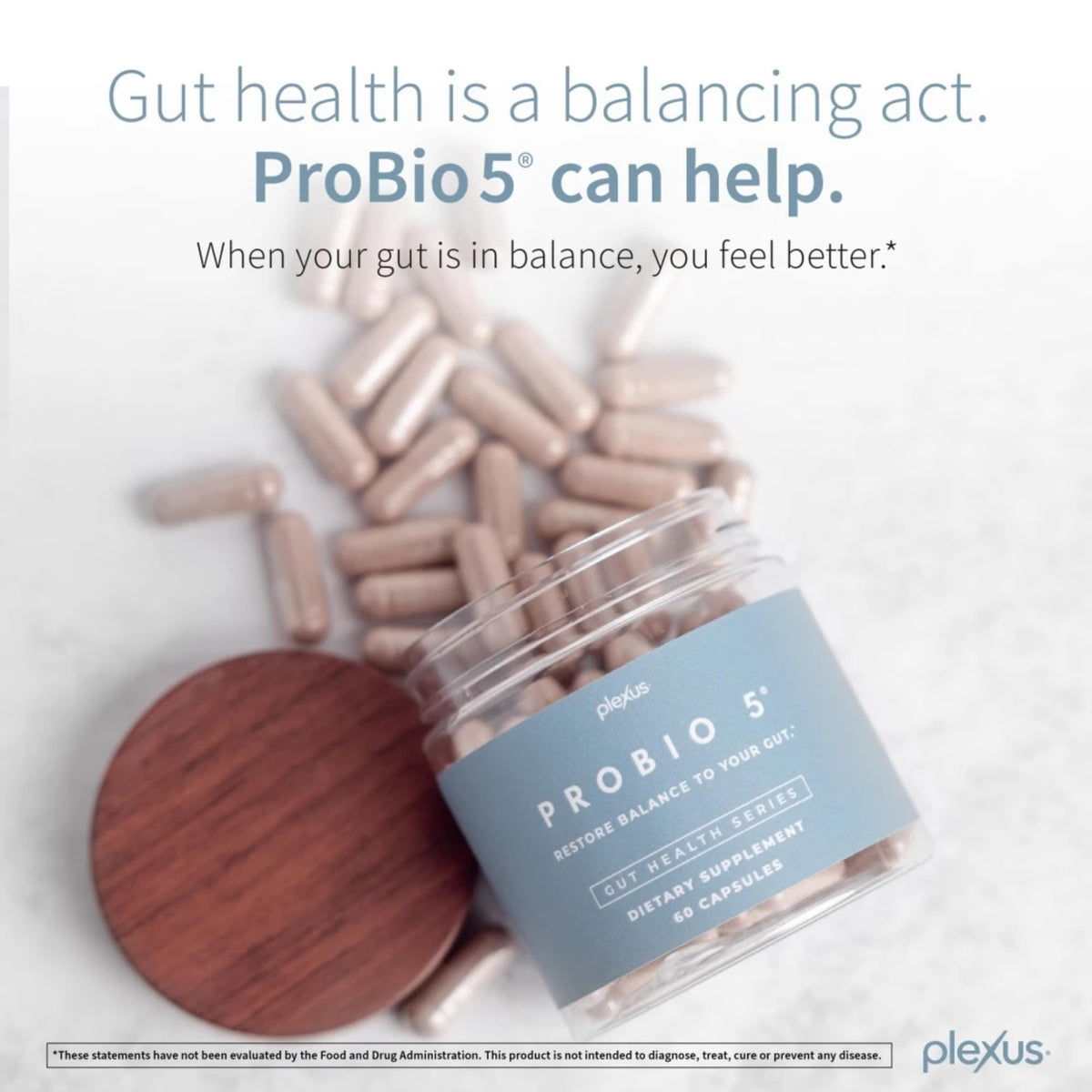 Plexus ProBio 5 capsules on a wooden table