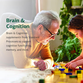 Standard Process Choline 90 Tablets with a glass of water