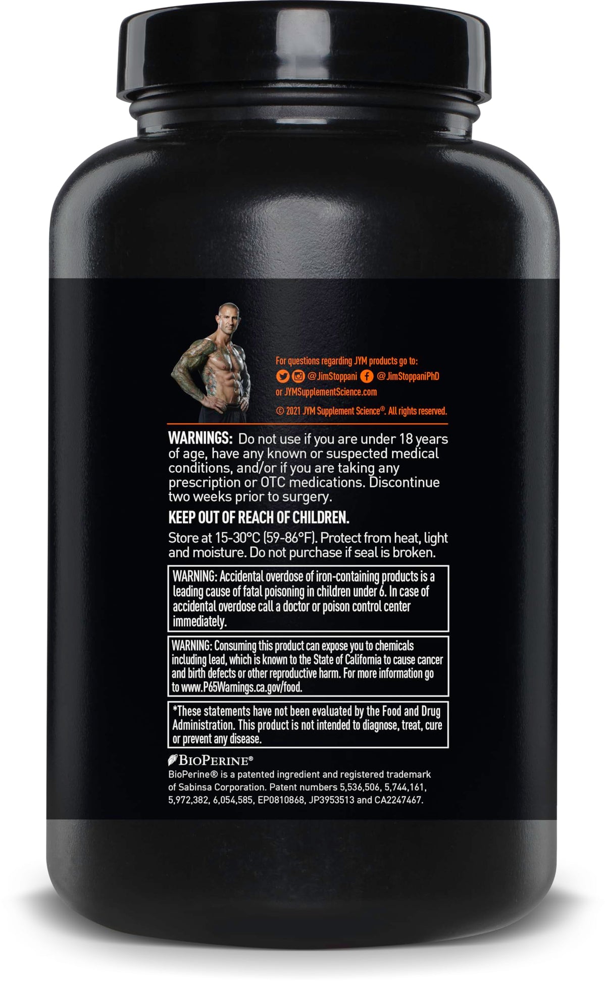 Vita JYM Daily Multivitamin tablets in hand