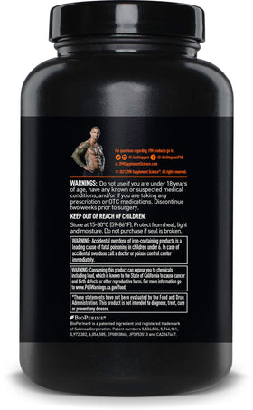 Vita JYM Daily Multivitamin tablets in hand