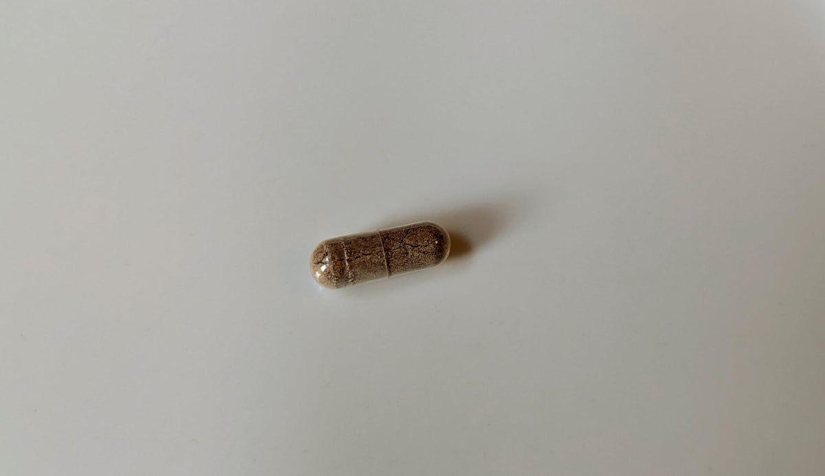 Vitalité Now! Mullein Capsules on a wooden table