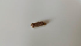 Vitalité Now! Mullein Capsules on a wooden table