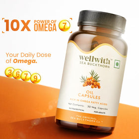 Wellwith Sea Buckthorn Berry Oil softgels on a wooden background