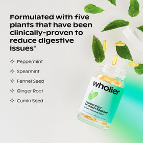 wholier Peppermint Stomach Soother capsules on a wooden surface